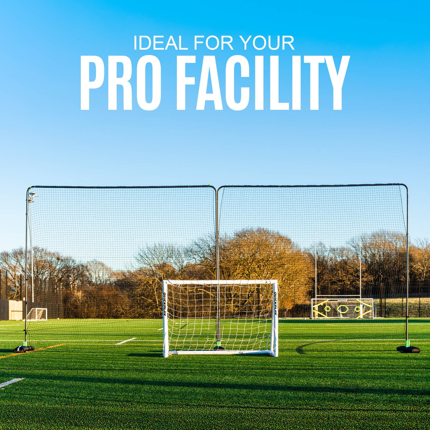 10ft Barrier Net System Freestanding: two panels on bases behind a small white goal on an artificial field, with the text "Ideal for your pro facility".