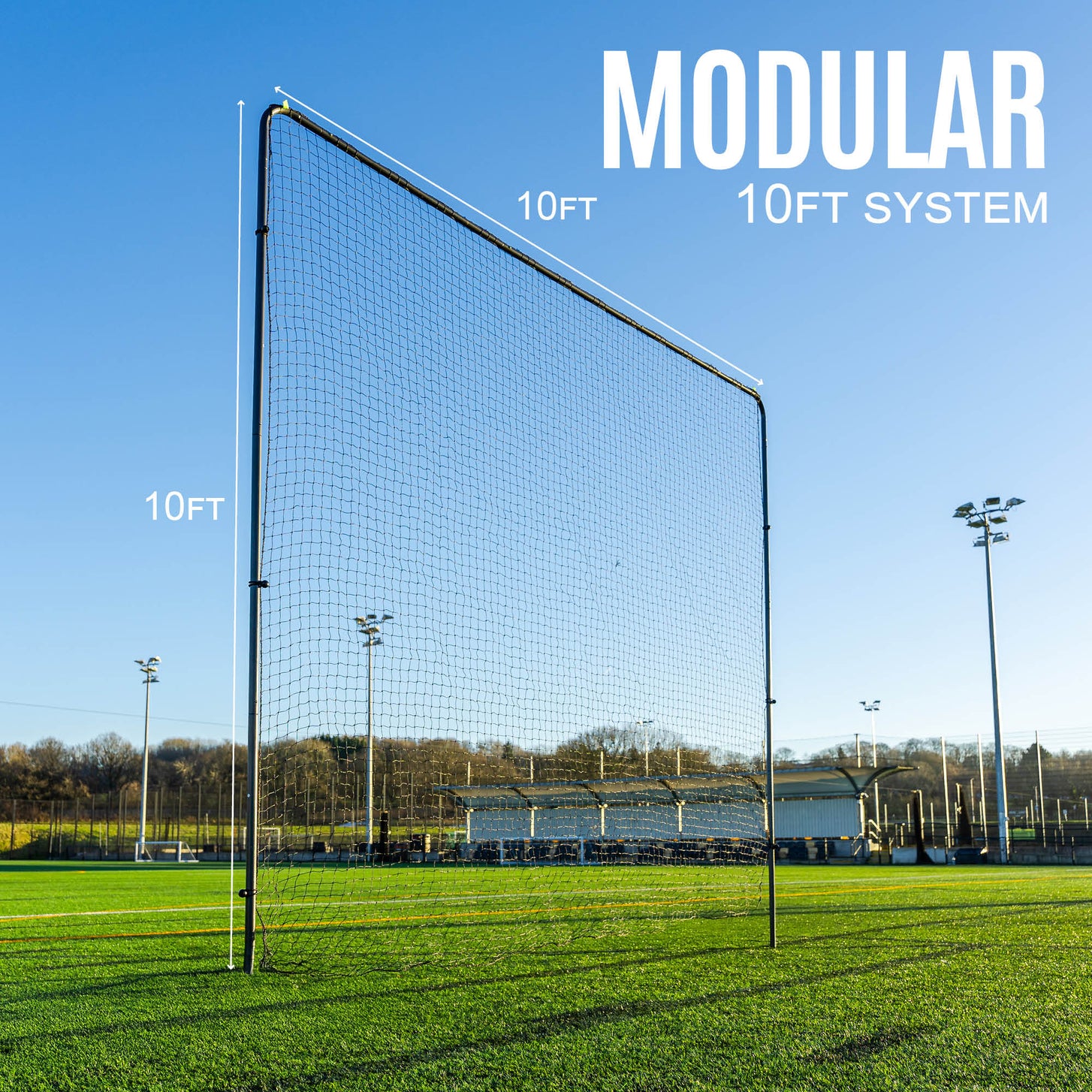 10ft Barrier Net System In-Ground: one panel on an artificial field, marked 10ft high and 10ft wide, with the text "Modular 10ft system".
