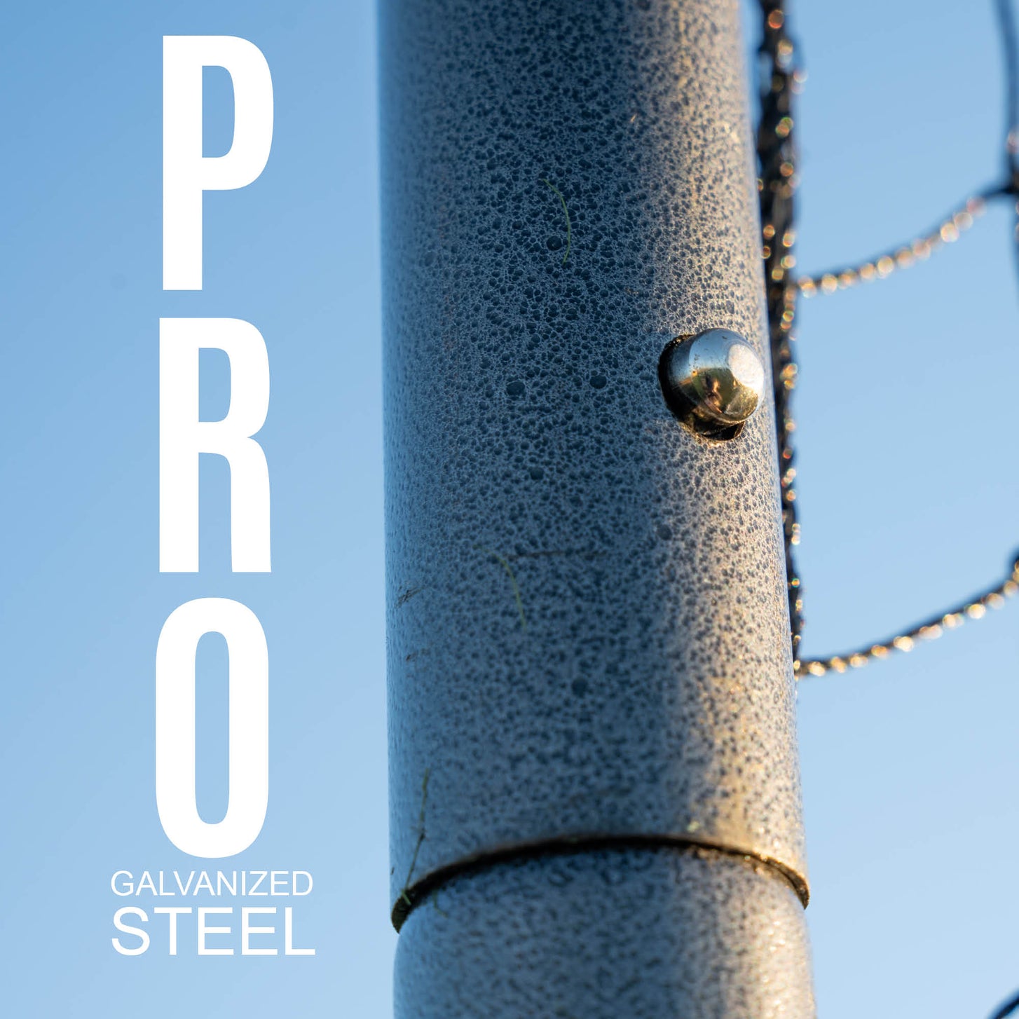 10ft Barrier Net System In-Ground: close up of a gray textured steel pole with a push button beside the net, with the text "PRO galvanized steel".