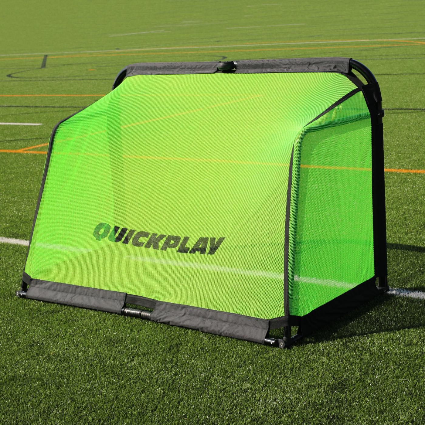 PRO ALU Training Soccer Goal 6x4' seen from behind, showing the QUICKPLAY logo on the green back net, on artificial turf.