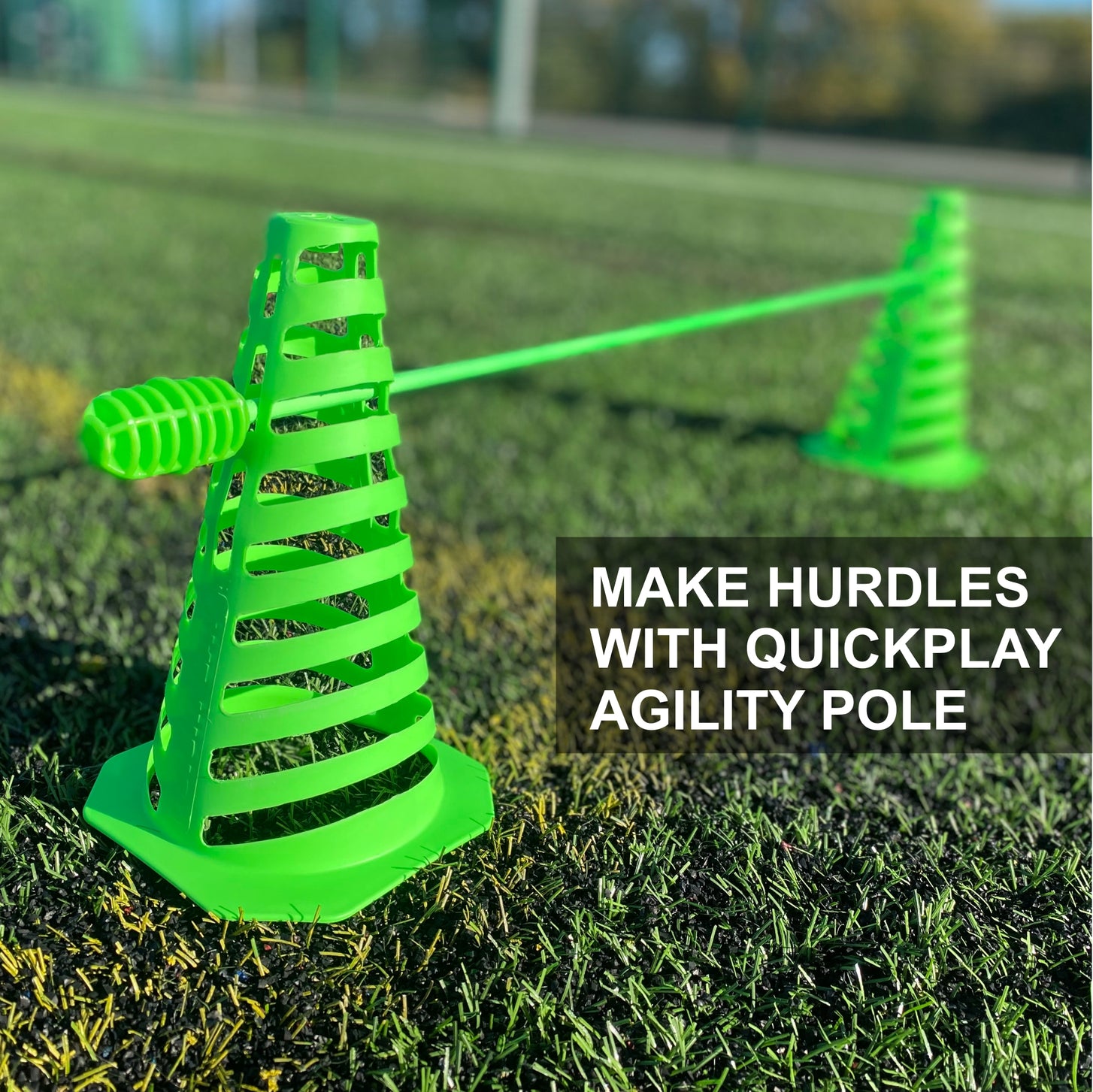 Two green 9" Tall Collapsible Cones with a green pole through them as a hurdle, with the text "Make hurdles with QUICKPLAY Agility Pole".