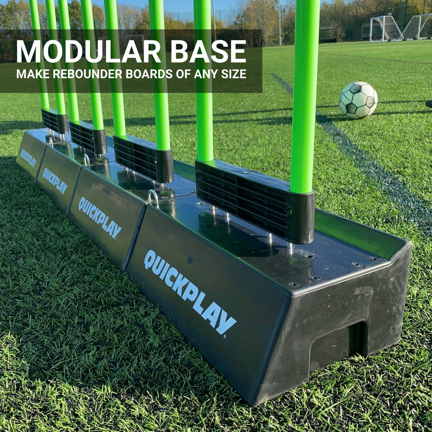 Linked REPLAY Block Dual Angle Rebound Boards holding green poles on turf, with the text "Modular base, make rebounder boards of any size".