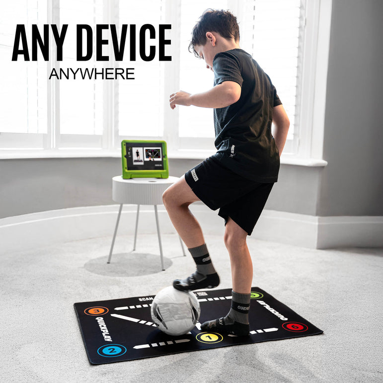 Person playing with a soccer ball on a ball mastery mat with 'Any Device Anywhere' text and a tablet in the background.