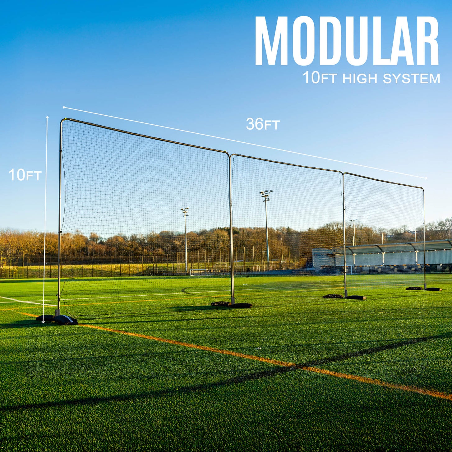 10ft Barrier Net System Freestanding: three panels on bases on an artificial field, marked 36ft wide and 10ft high, with the text "Modular 10ft high system".