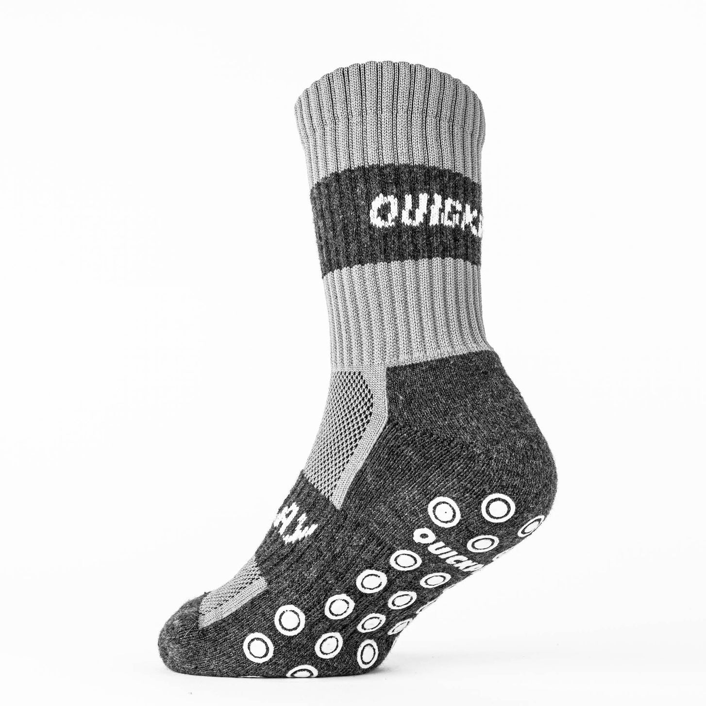 Gray and black sock with QUICKPLAY branding on a white background