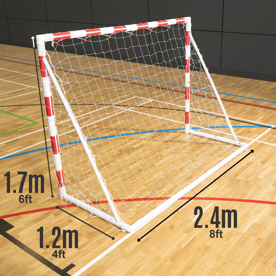 Rear of a Handball goal with dimensions on a wooden pitch