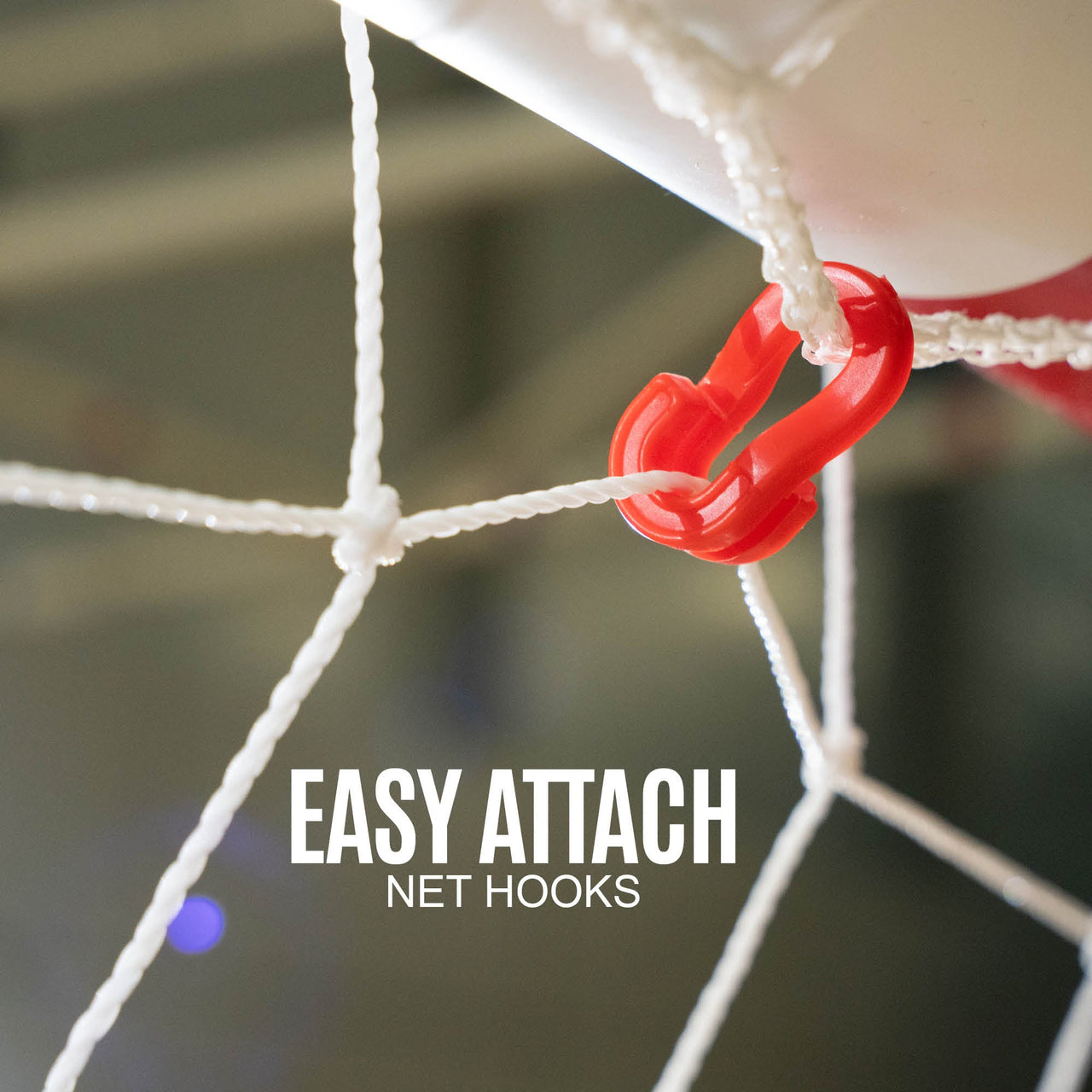 Red net hook attached to a white sports net with 'Easy Attach Net Hooks' text.