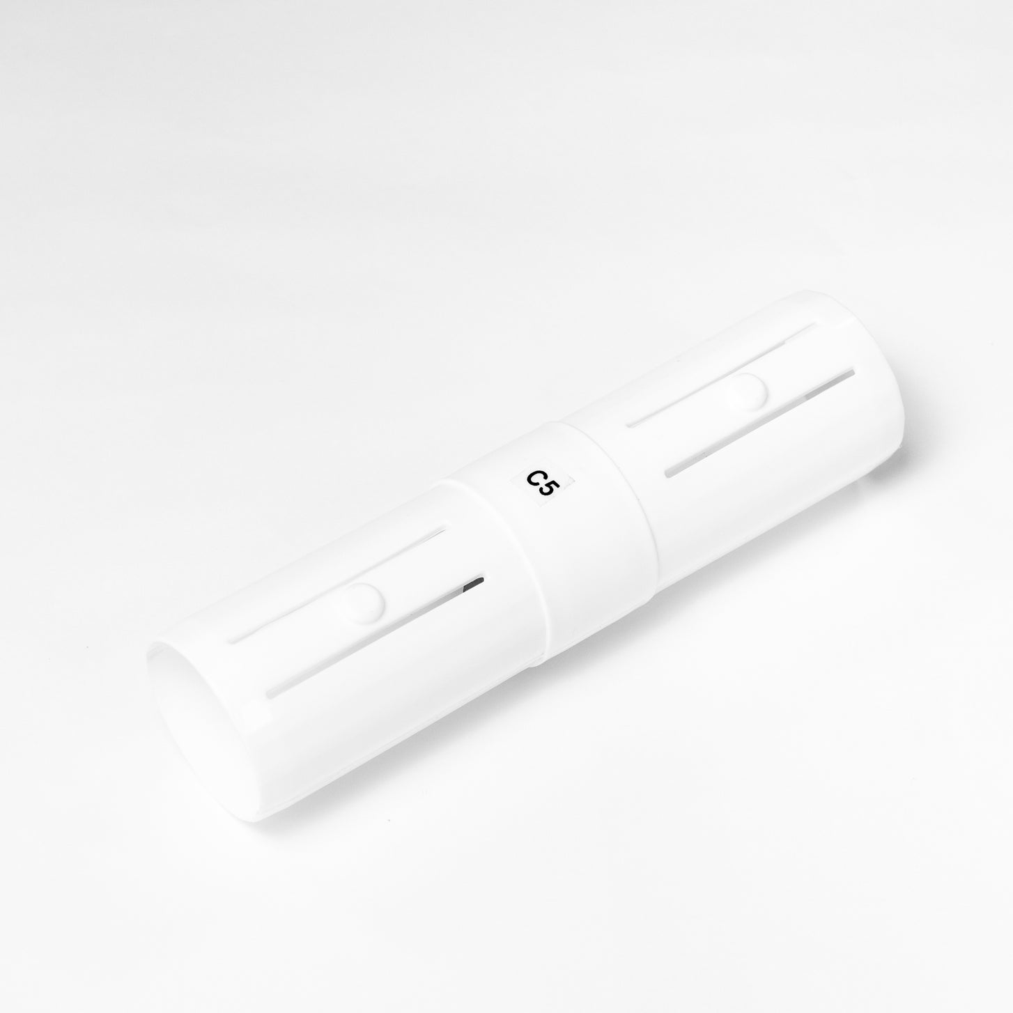 White Q-FOLD C5 connector tube marked "C5" with slotted ends, on a white background.
