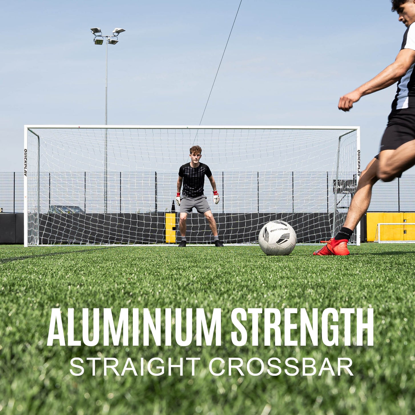Player shaping to shoot at a goalkeeper in the PRO ALU Match60 goal 18.5x6.5', with a straight crossbar.