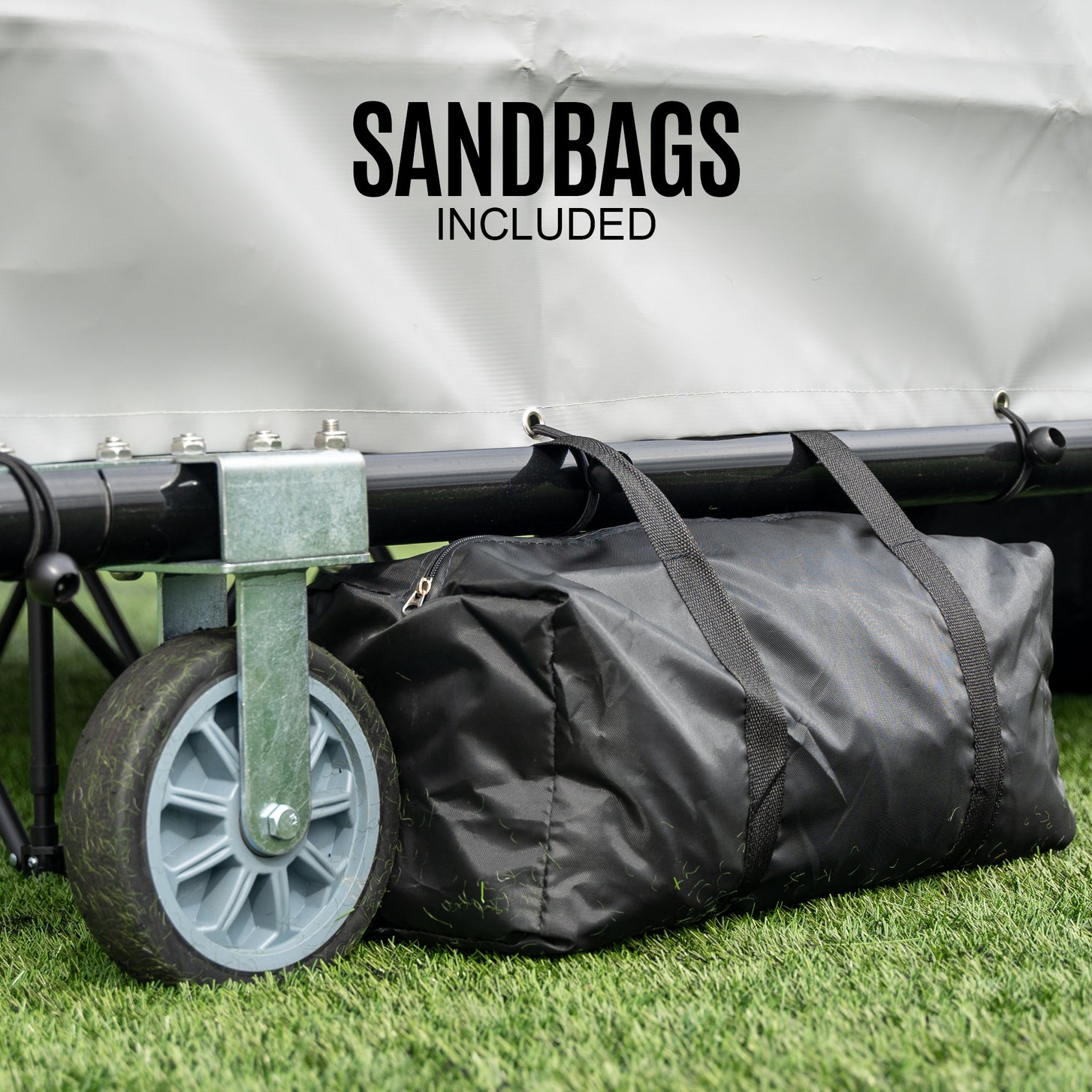 Black bag tied under the PRO ALU Club Shelter 16x6' frame beside a wheel, with the text "Sandbags included".