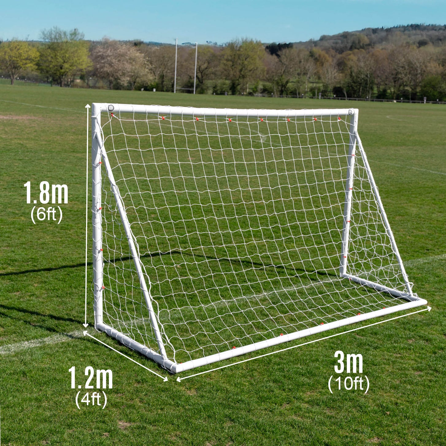 Q-FOLD 10x6' goal on a grass field, marked 10ft wide, 6ft high and 4ft deep.