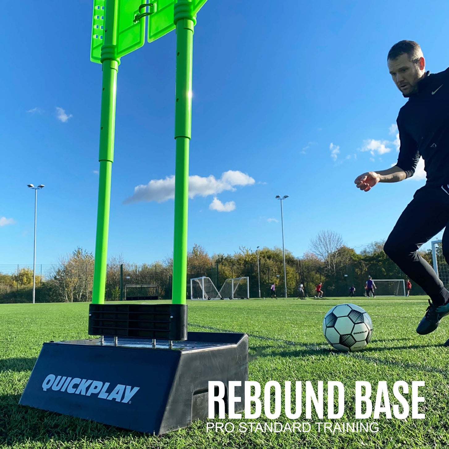 Player passing a soccer ball toward a black REPLAY Block base holding a green frame, with the text "Rebound base, pro standard training".