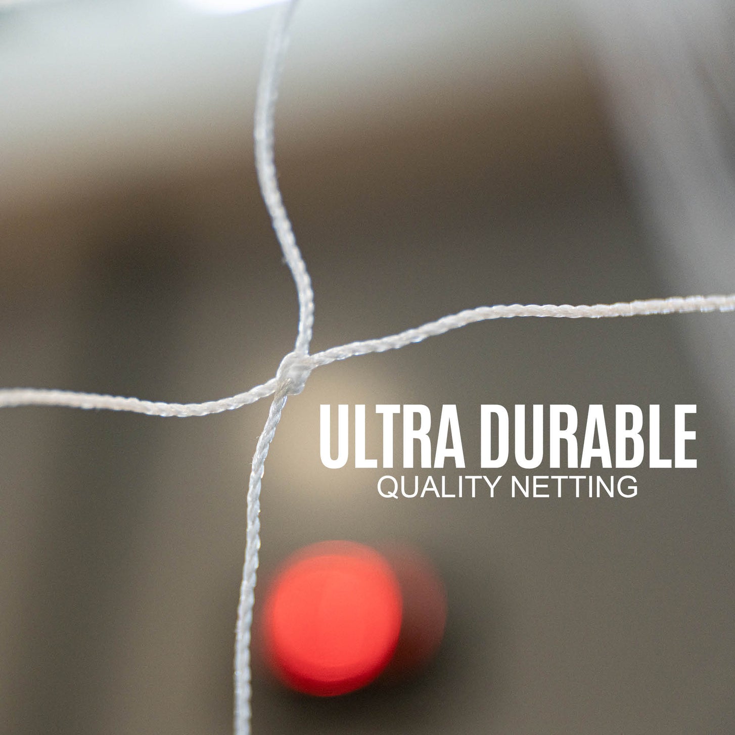Portable Youth Handball Goal 7.9x5.6' close up: a knot in the white net, with the text "Ultra durable quality netting".