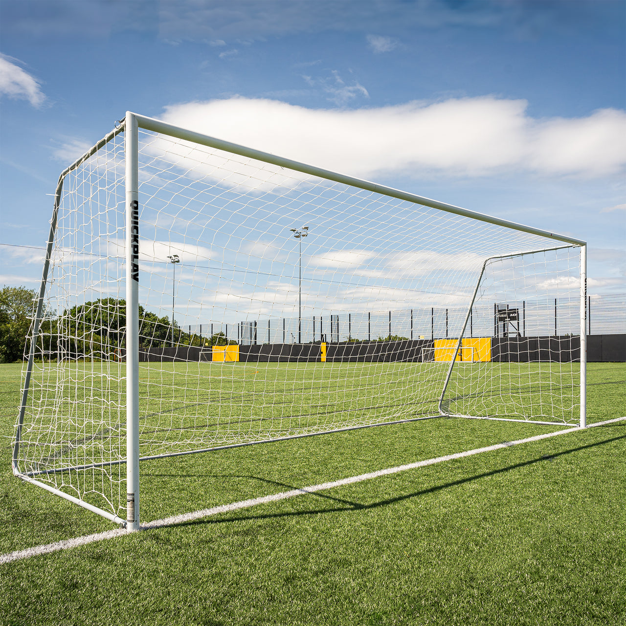 QUICKPLAY Pro Alu Soccer goal on a green field with a clear sky