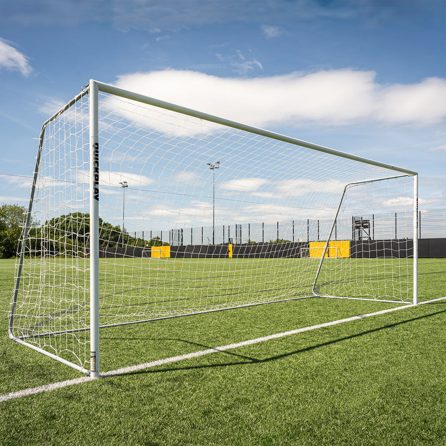 QUICKPLAY Pro Alu Soccer goal on a green field with a clear sky