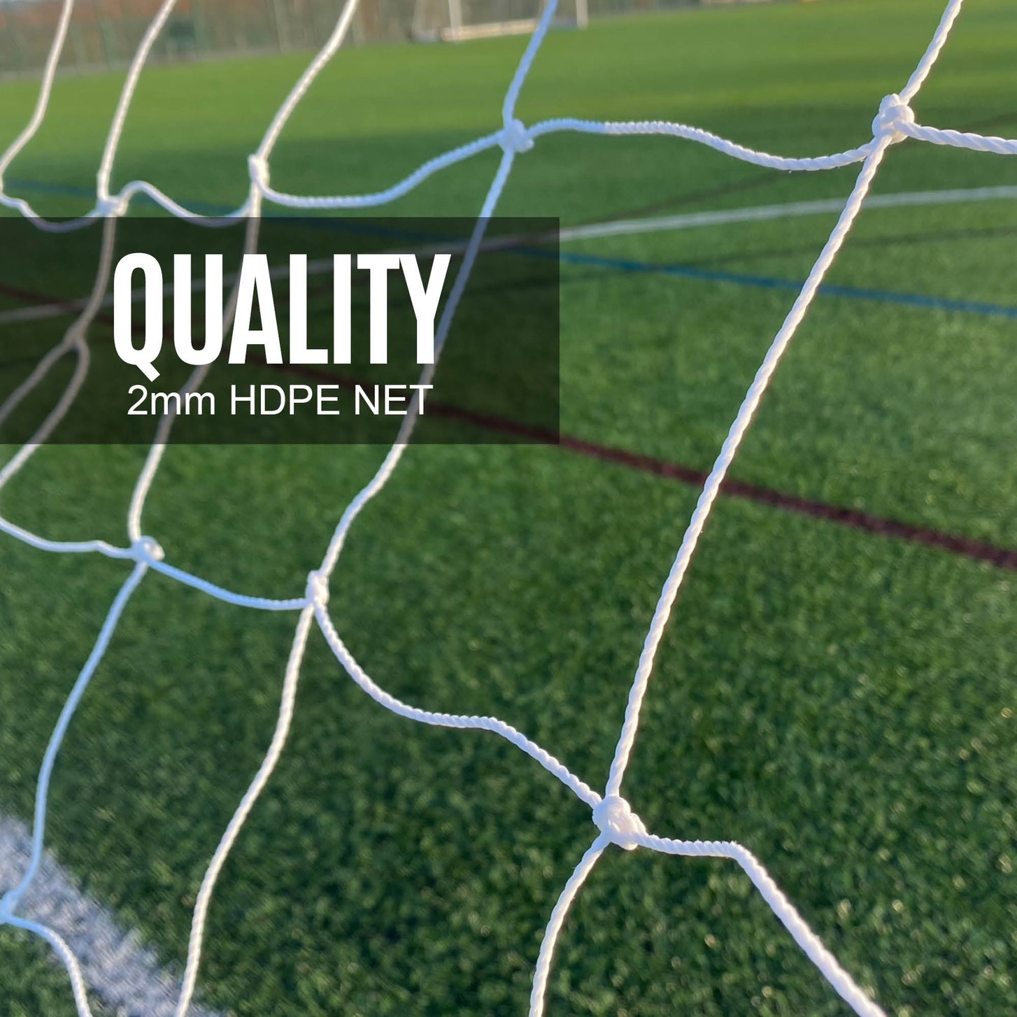 Close-up of the white Q-FOLD Folding Soccer Goal 16x7' net over an artificial field, with the text "Quality, 2mm HDPE net".