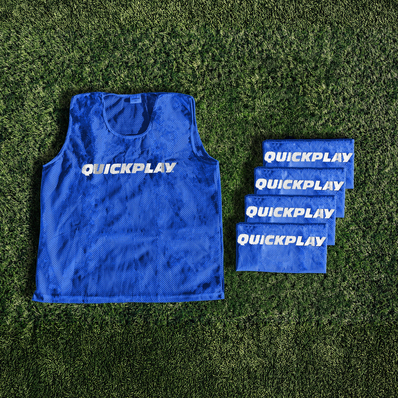 A blue QUICKPLAY breathable mesh training vest.