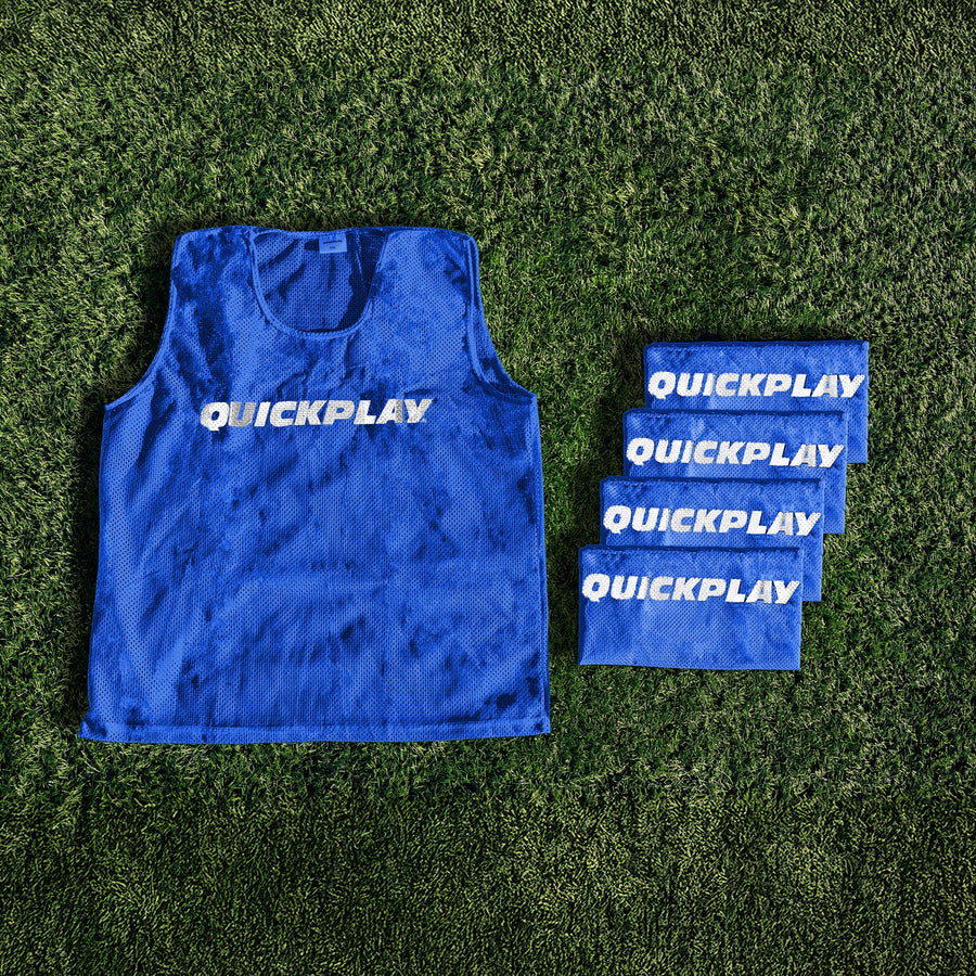 A blue QUICKPLAY breathable mesh training vest.