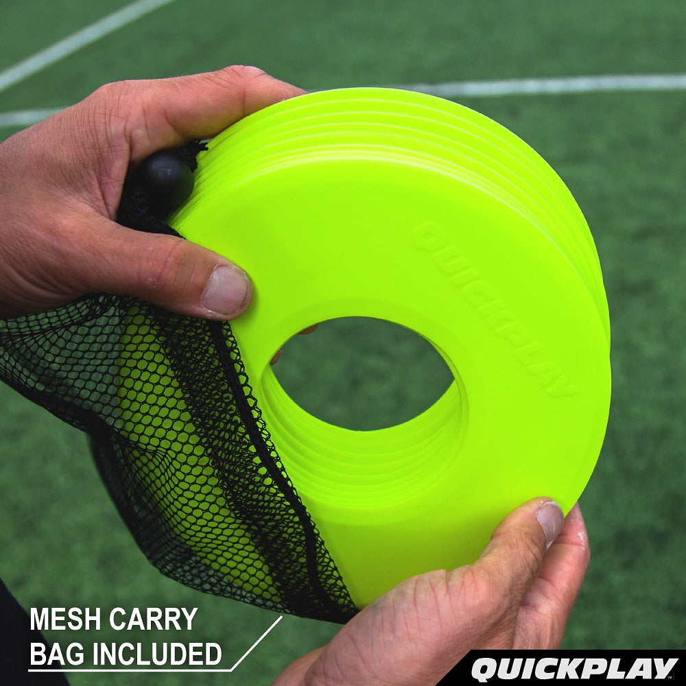 Hands holding a stack of neon yellow Flat Markers in a black mesh bag, with the text "Mesh carry bag included".