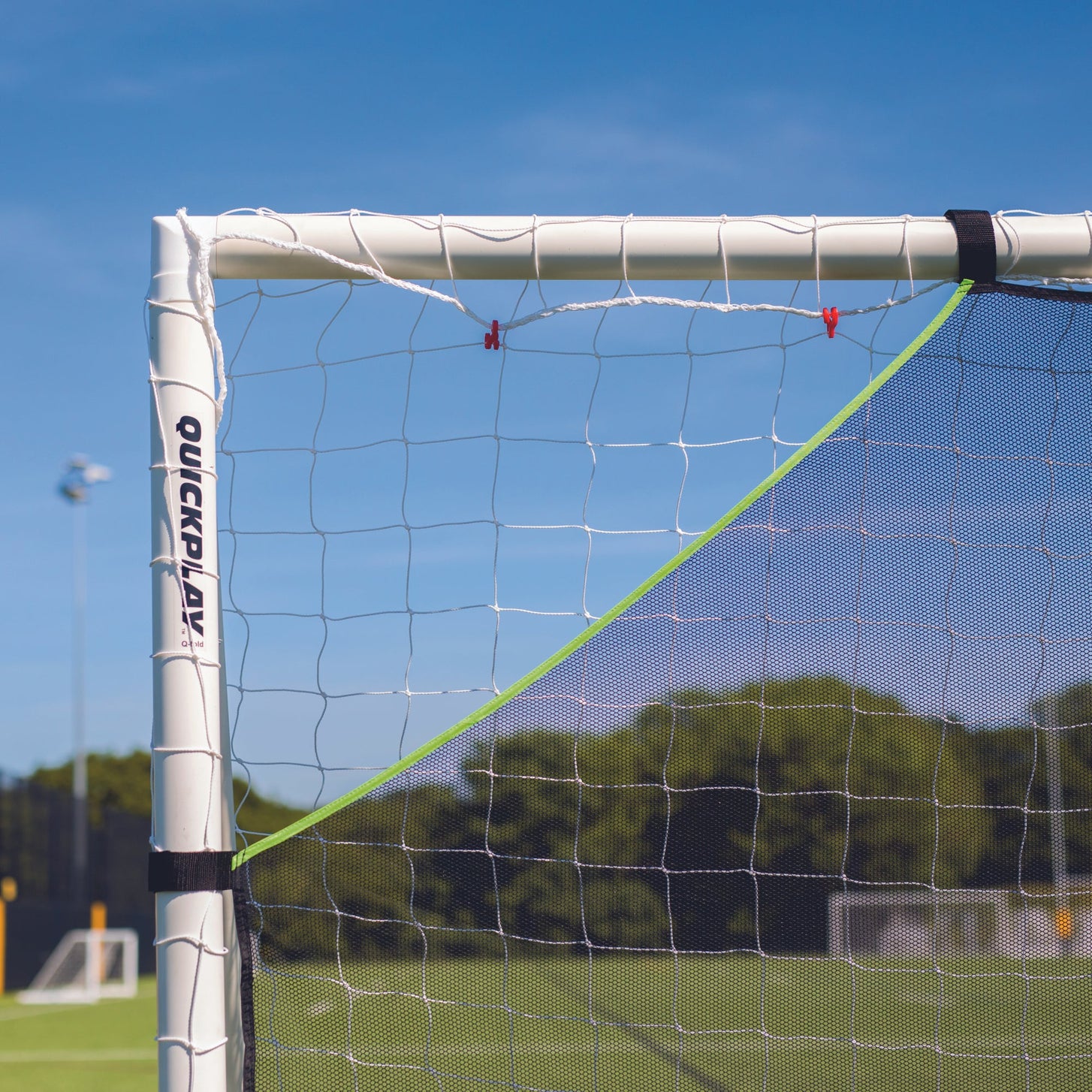 TARGET Net Lite 12x6': close-up of the top corner showing the open corner gap and a QUICKPLAY goal post